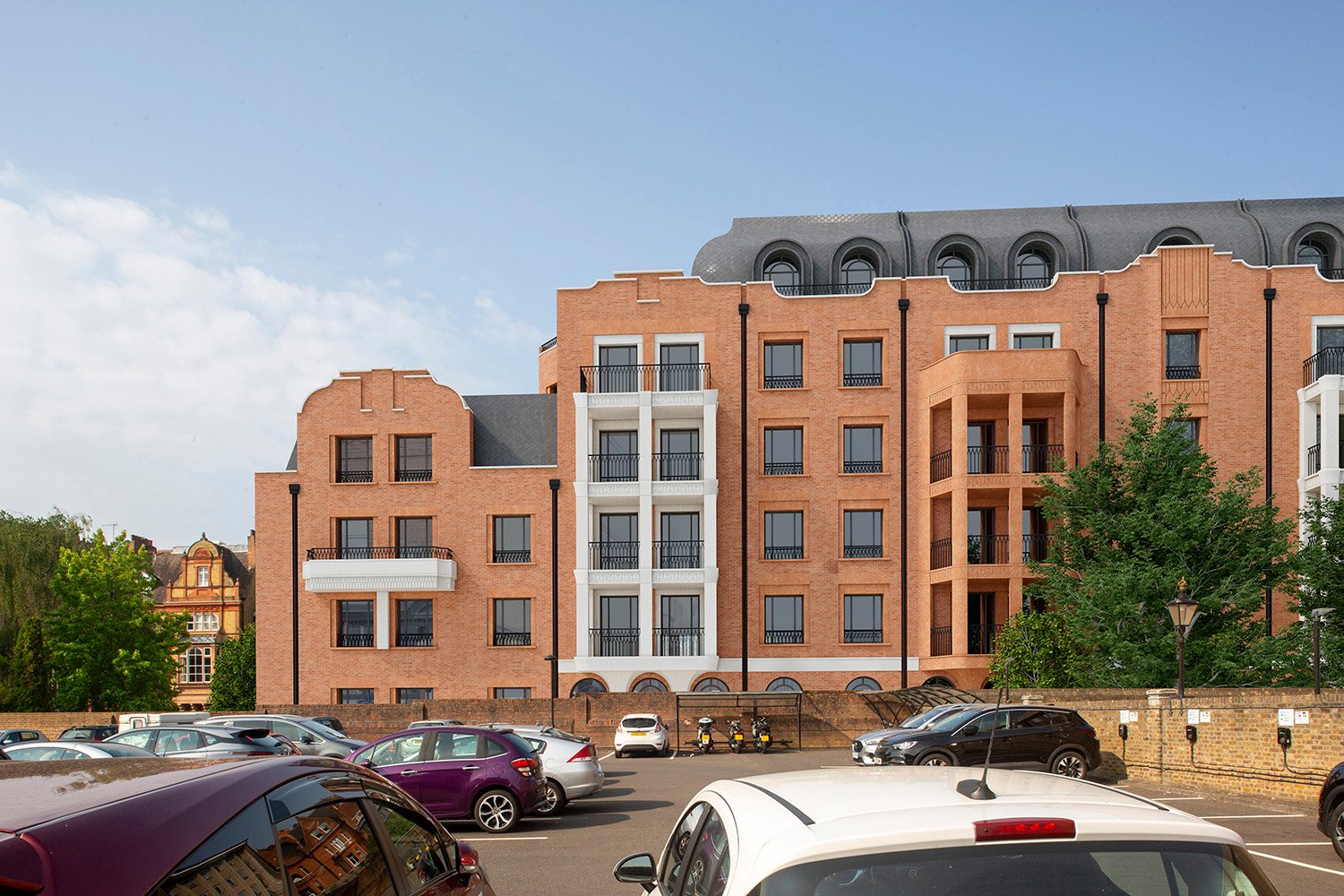 After image: view of London square's proposed building rises higher still, replacing the articulated roofscape with a flat, monolithic form that encloses the view.